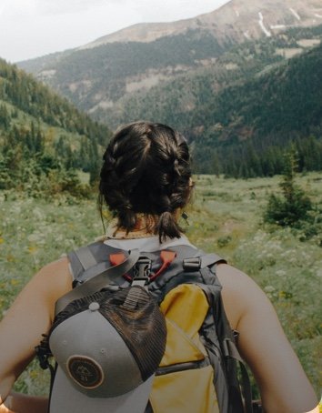 A hiker on a mountain peak, captured with GoPro