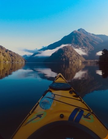 A kayaker on a river, captured with action camera